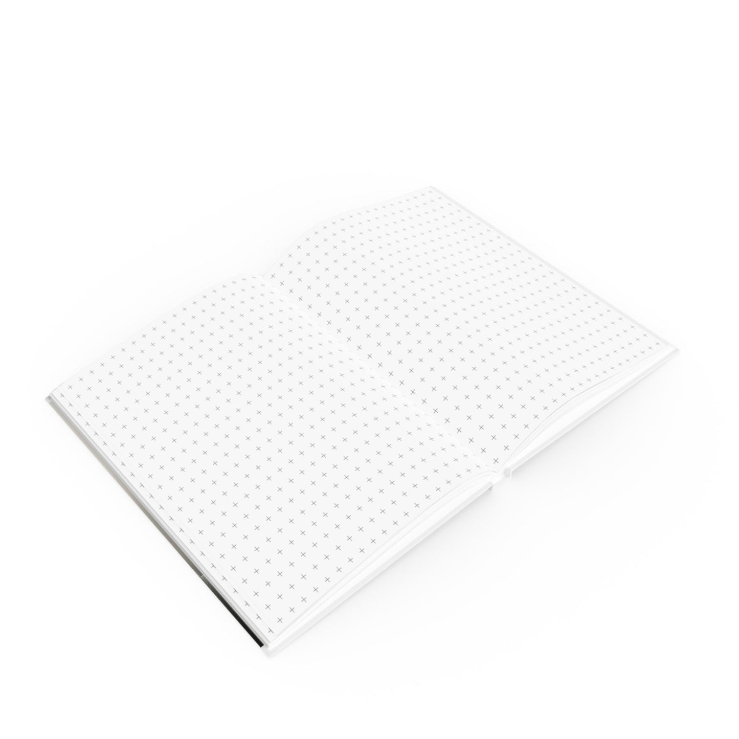 Open A5 journal showing graph page paper option, greyscale bench tree design