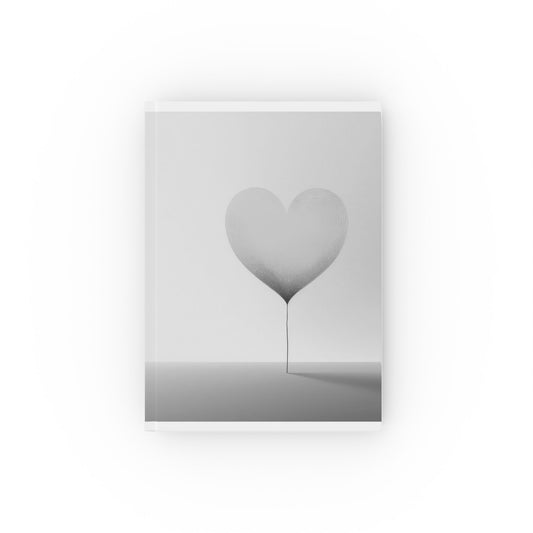 A5 hardcover journal with greyscale cover with large floating heart illustration