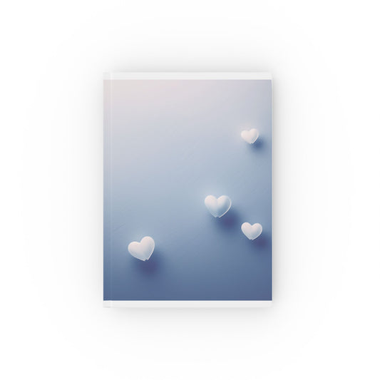 A5 hardcover journal with blue and cover and small floating hearts illustration