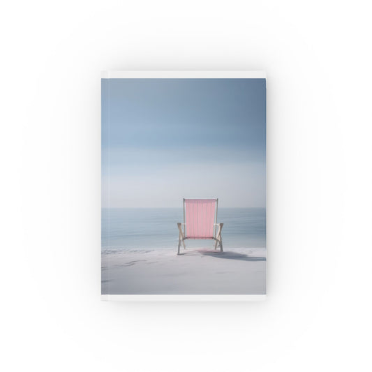 A5 hardcover journal with blue and white cover, and pink beach chair facing sea, coastal illustration