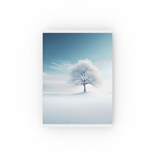 A5 hardcover journal with blue and white cover with winter tree in snow illustration