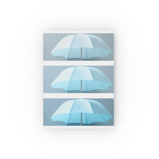 A5 hardcover journal with blue and white cover and repeated umbrella illustration