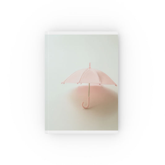 A5 hardcover journal with pink and white cover and vintage umbrella illustration