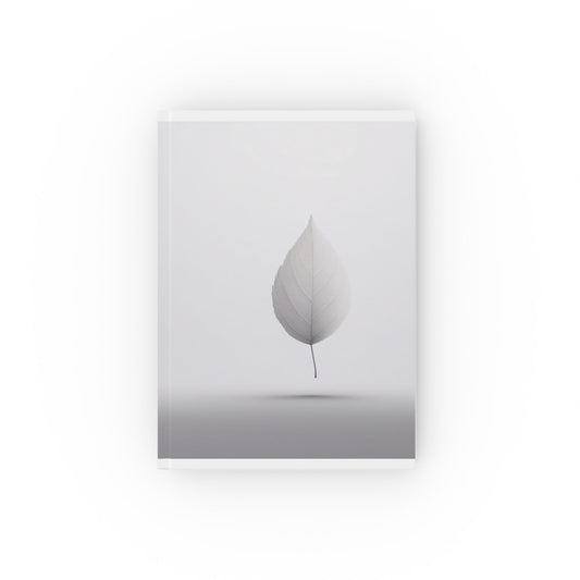 A5 hardcover journal with greyscale cover and single floating leaf illustration