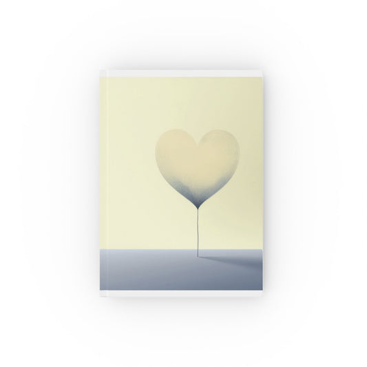 A5 hardcover journal with pale yellow and blue cover with large floating heart illustration