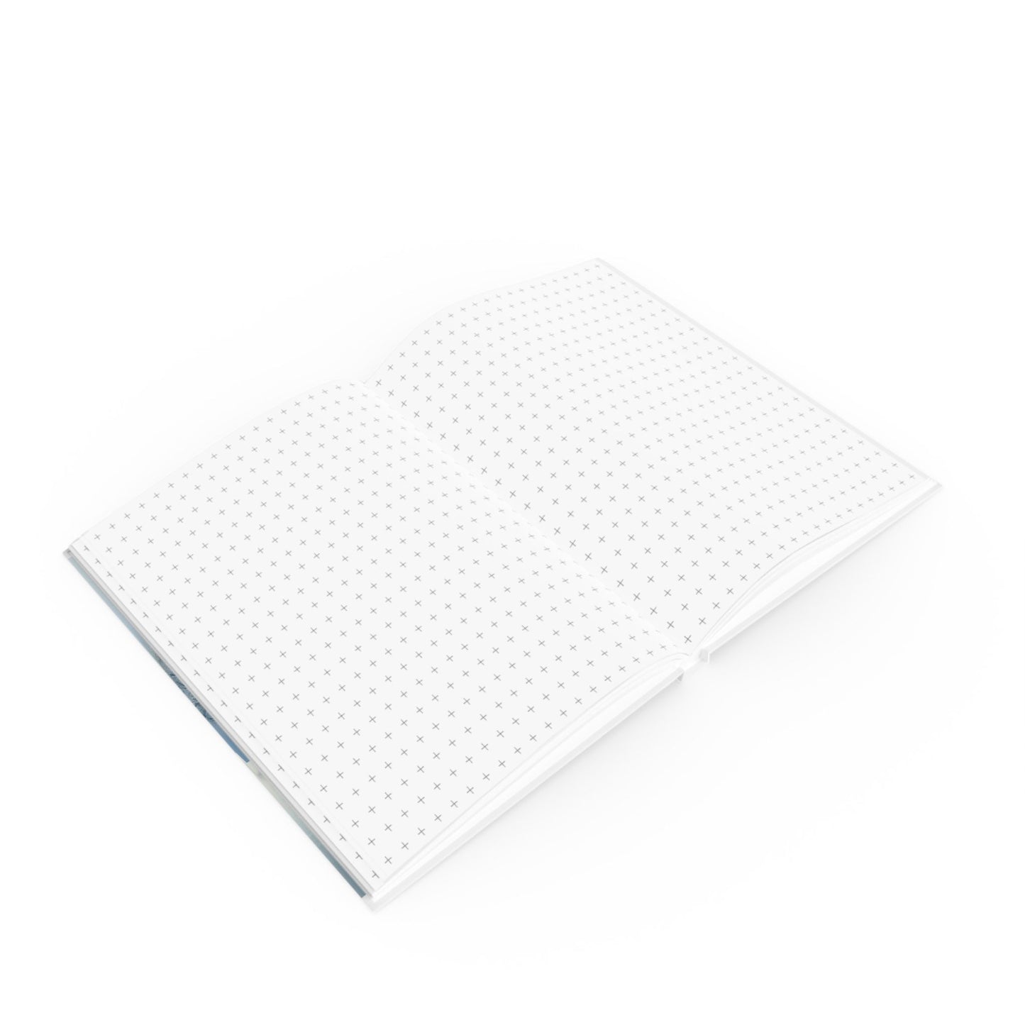 Open A5 journal showing graph page paper option, blue and white nature bench tree design