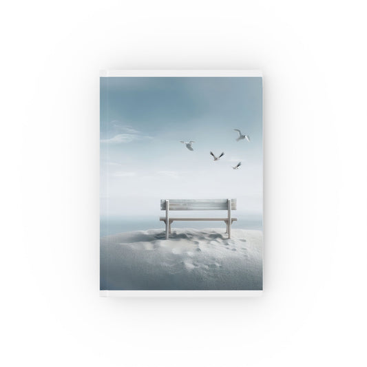 A5 hardcover journal with blue and white cover and bench on sand coastal illustration