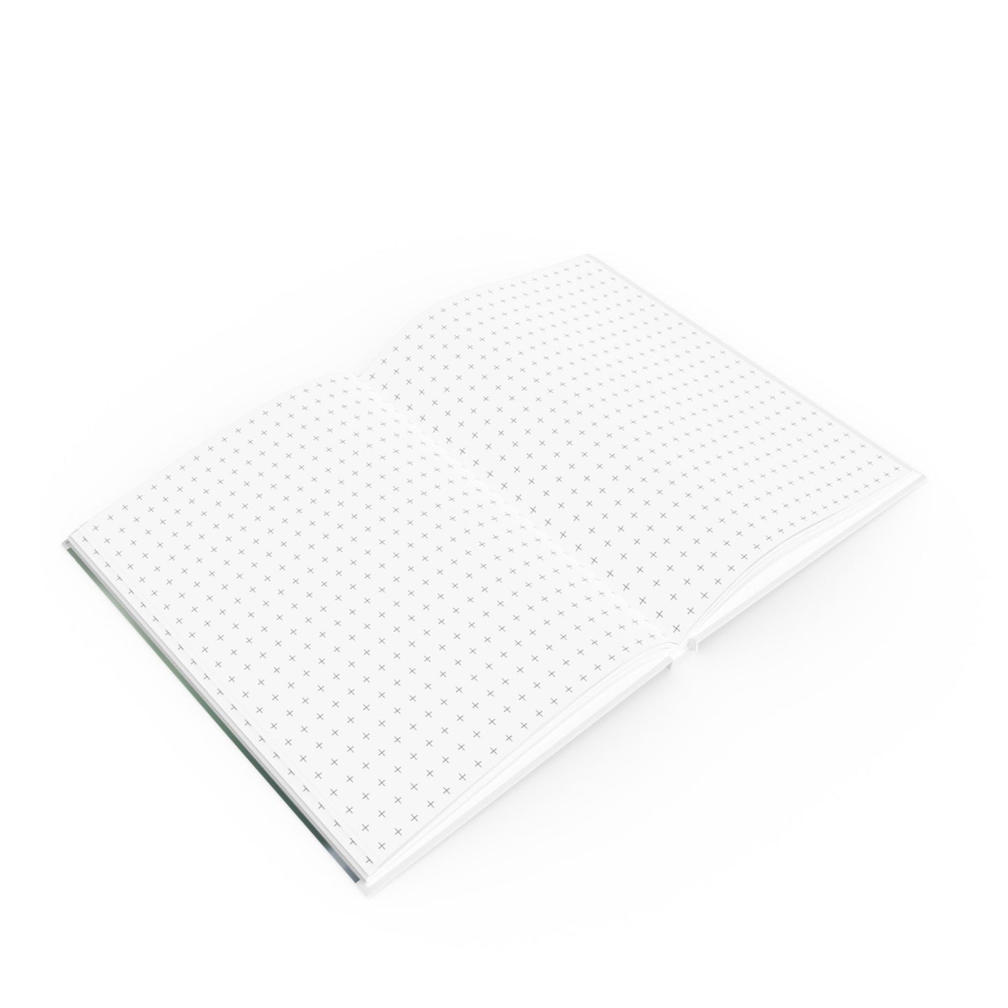 Open A5 journal showing graph page paper option, green and white floating leaves design