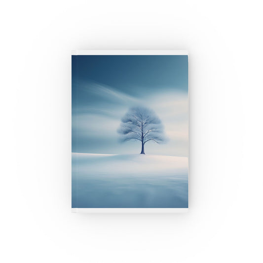 A5 hardcover journal with blue and white cover with winter tree in snow illustration