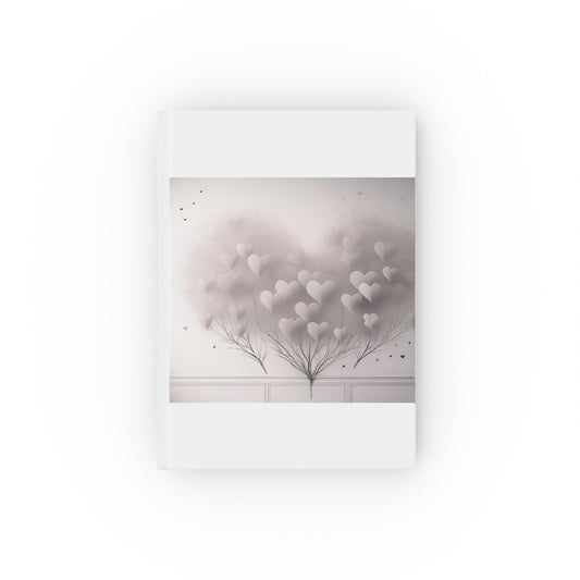 A5 hardcover journal with pink grey and white cover and whimsical hearts illustration