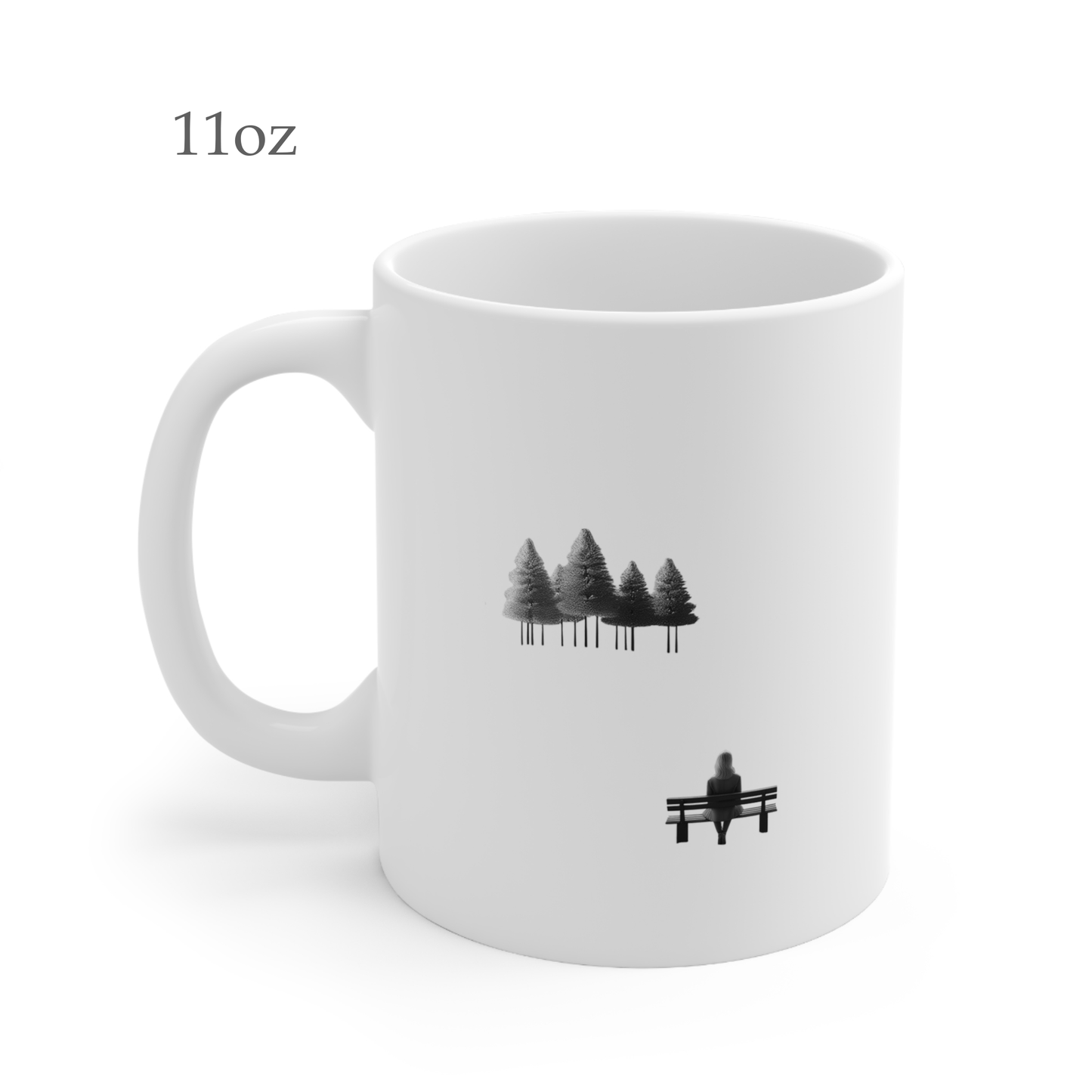 Left side view of black and white ceramic line art mug, 11oz size, showing handle.