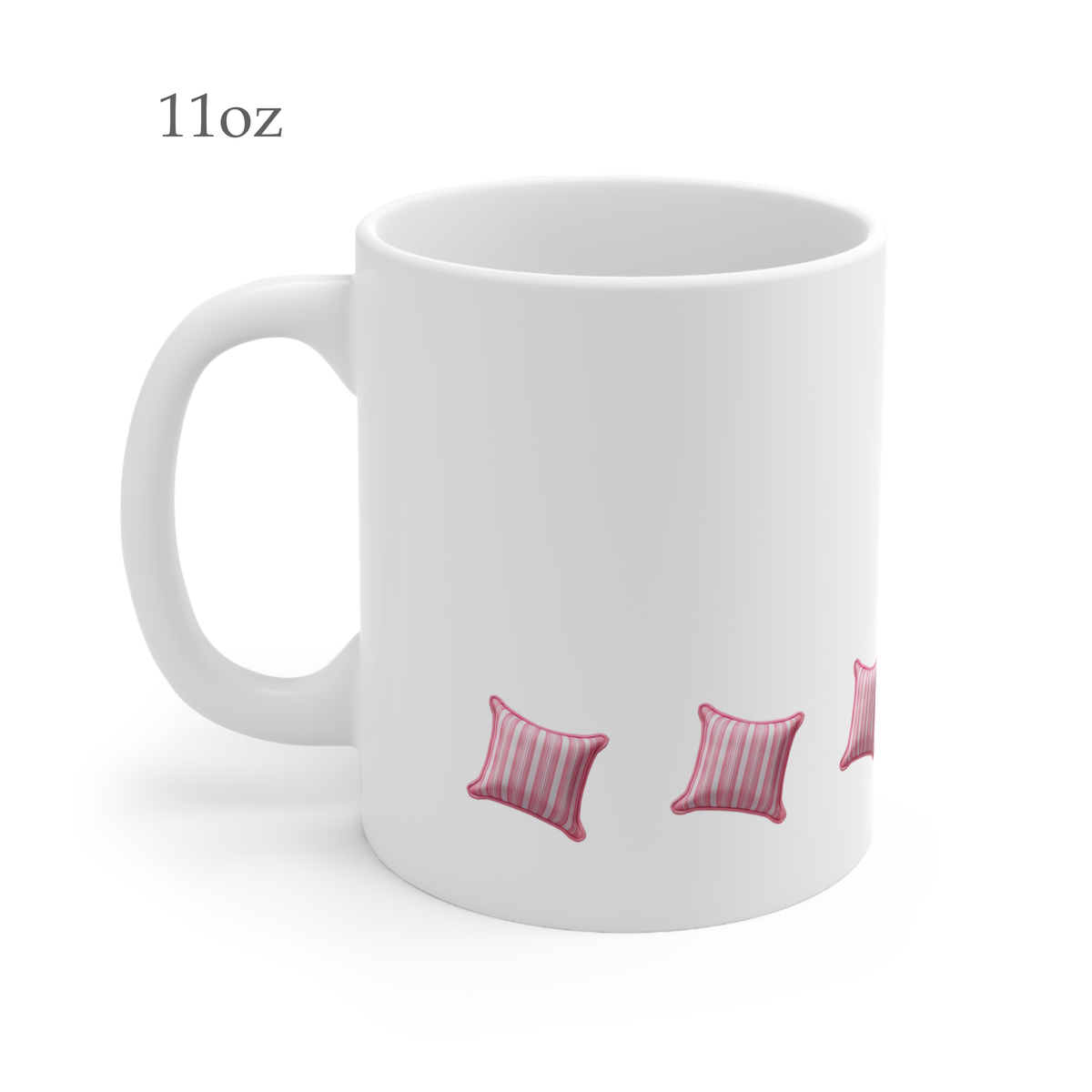 Left side view of pink and white striped cushion mug, 11oz size, showing handle