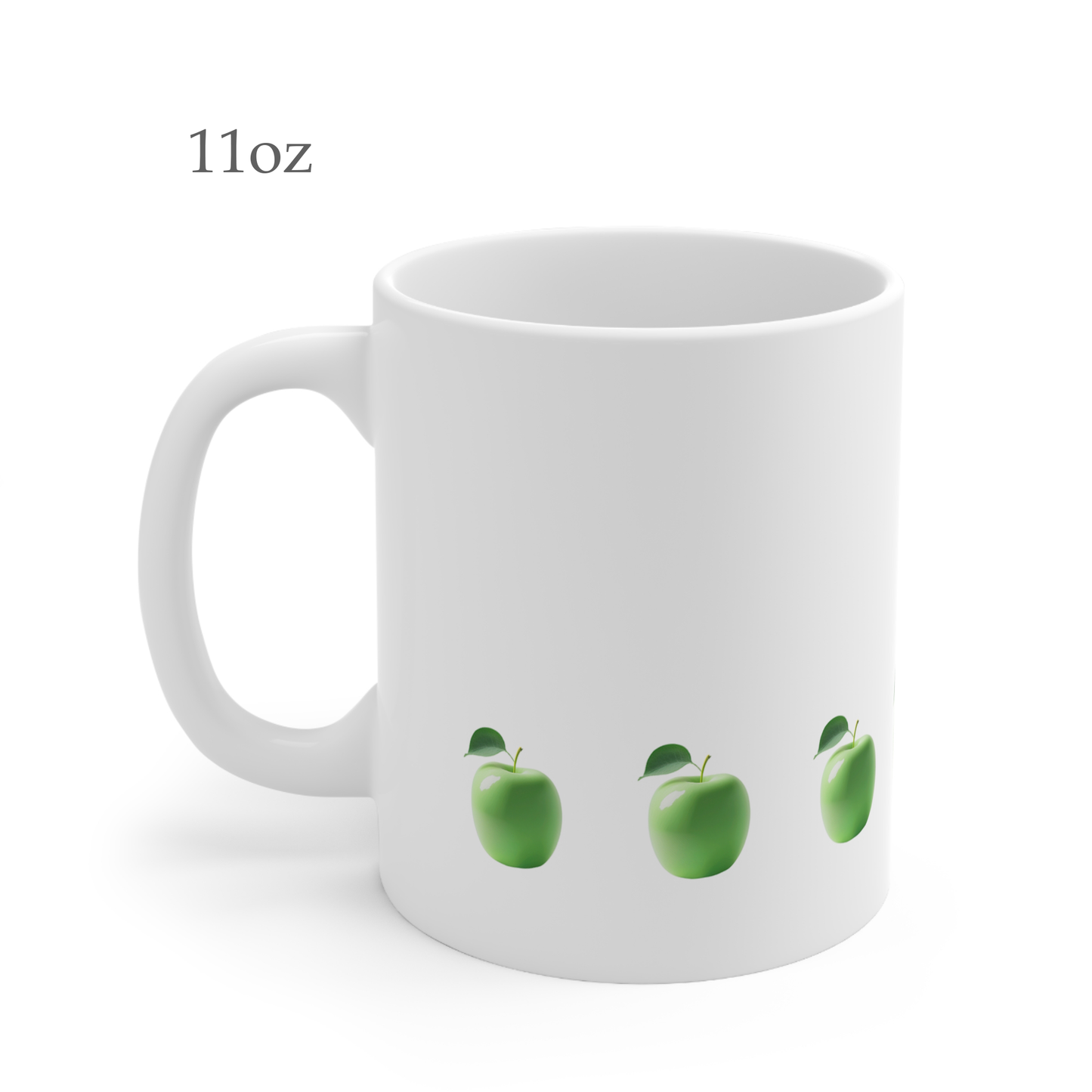 Left side view of white ceramic apple mug, 11oz size, showing handle