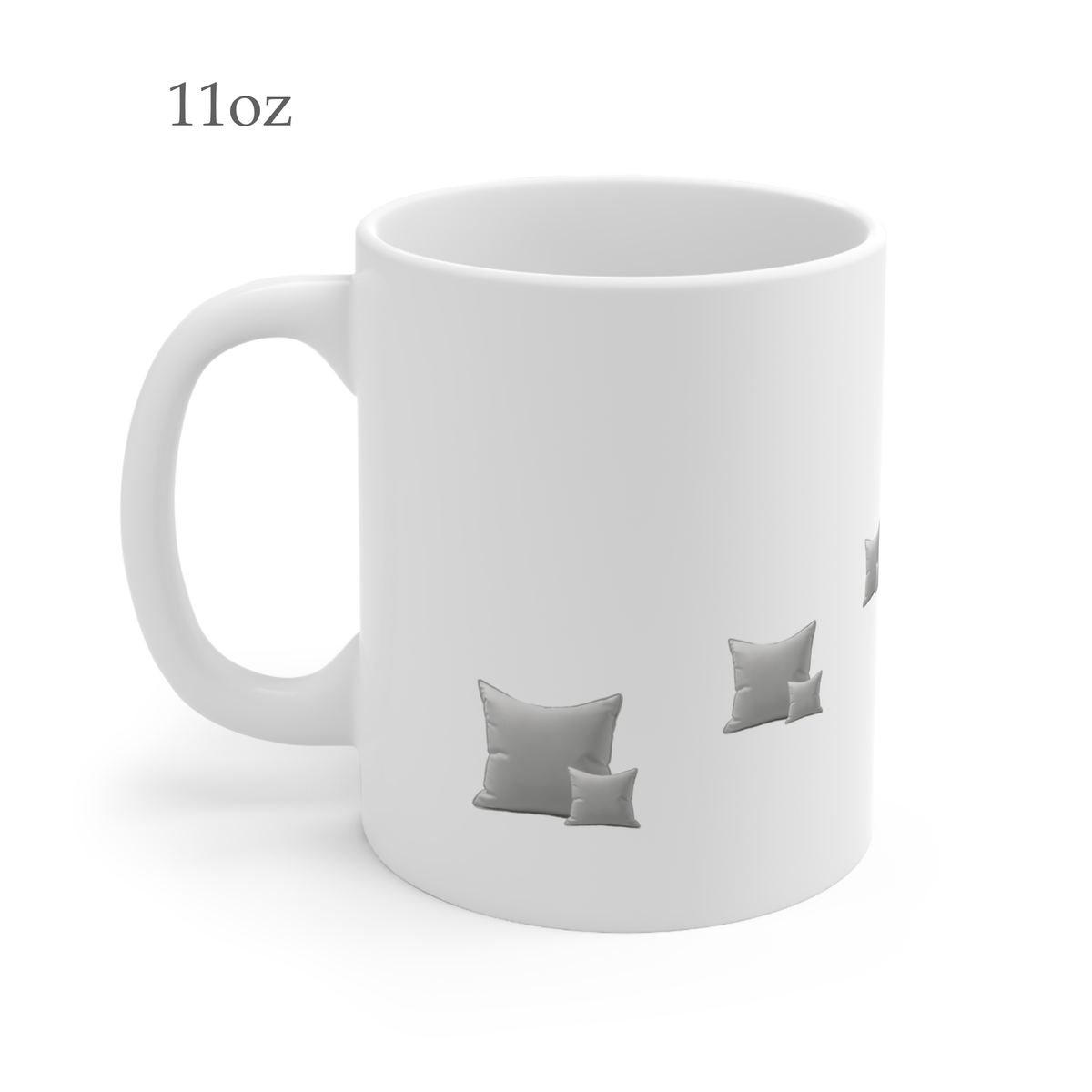 Left side view of white mug decorated with grey throw pillow cushions, 11oz size, showing handle