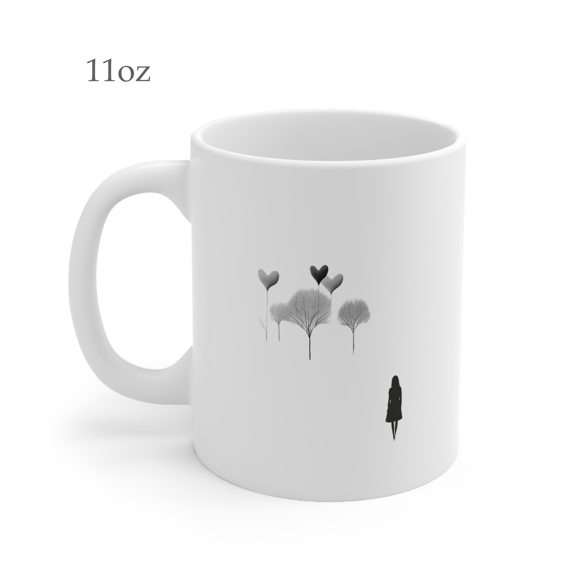 Left side view of black and white ceramic line art mug, 11oz size, showing handle.