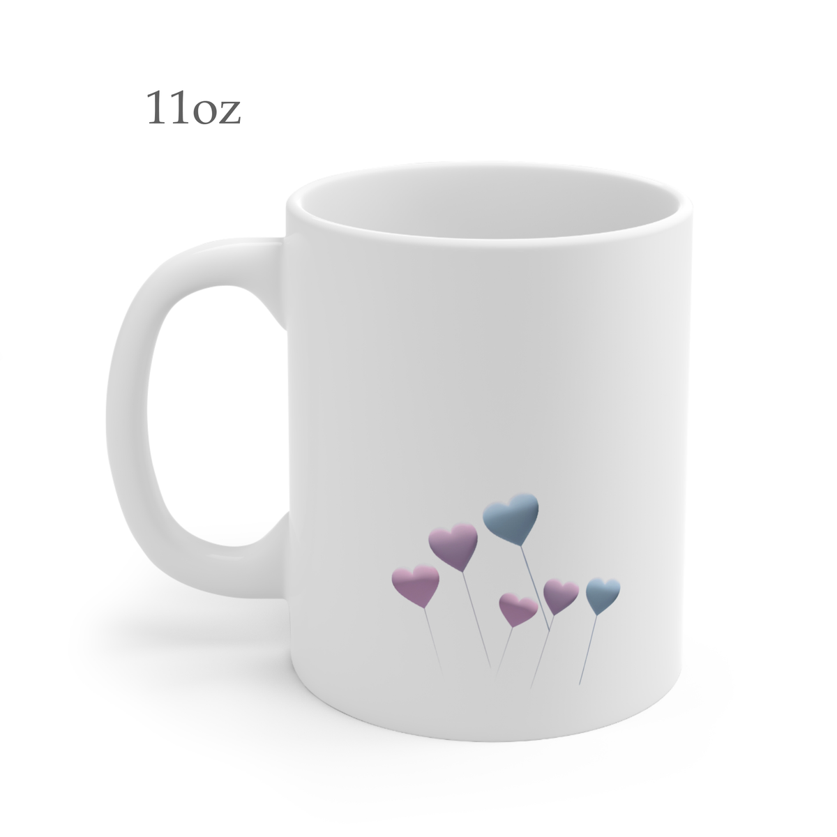 Left side view of white ceramic pastel heart mug, 11oz size, showing handle