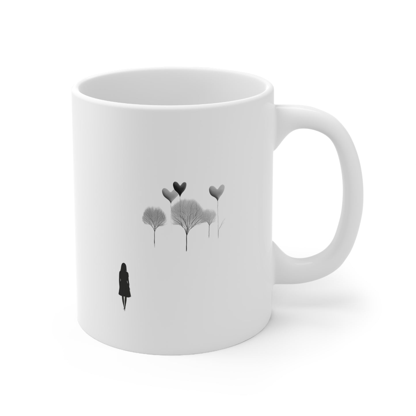 Right side view of black and white ceramic line art mug, 11oz size, showing handle