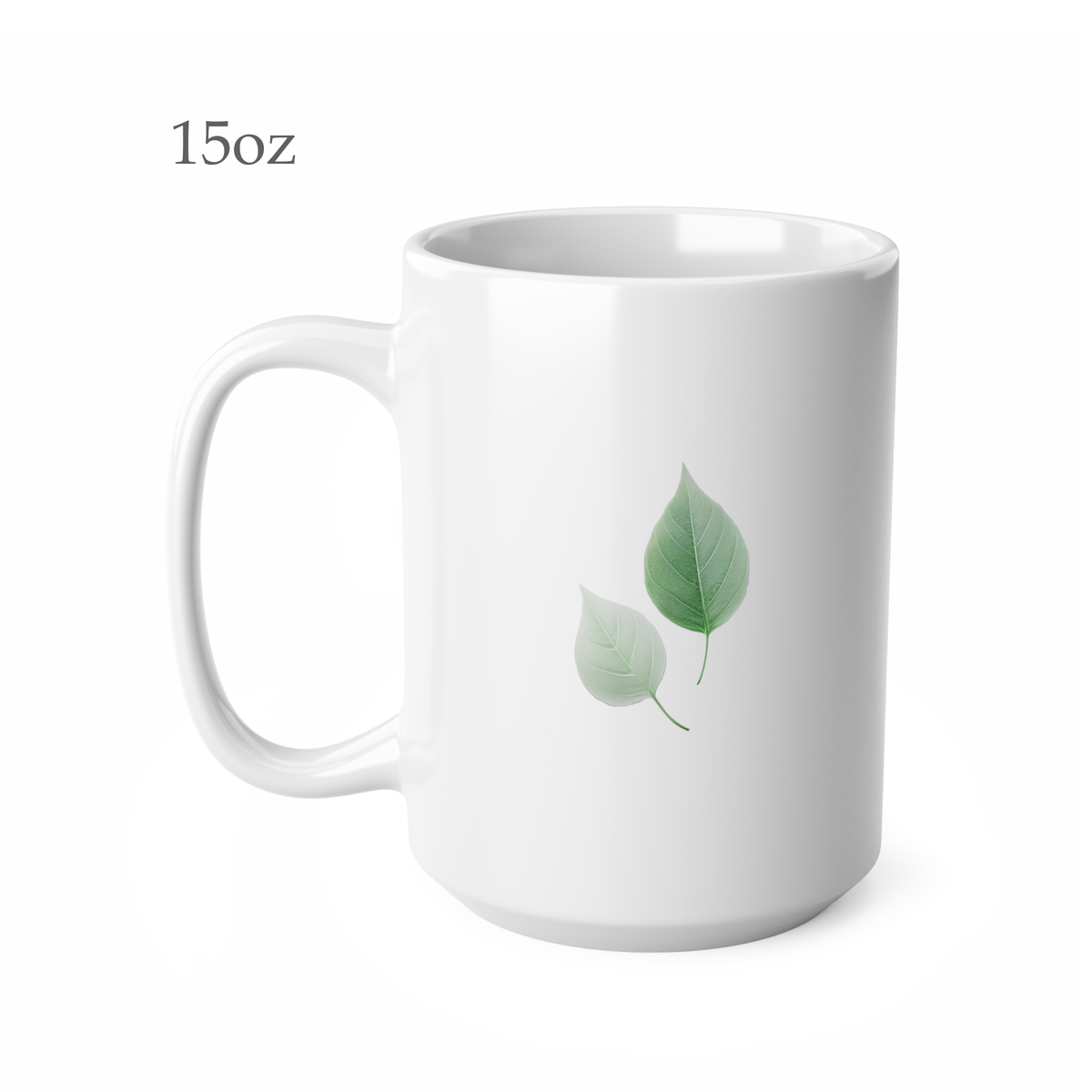 Left side view of white ceramic autumn leaf mug, 15oz size, showing two green leaves design and handle