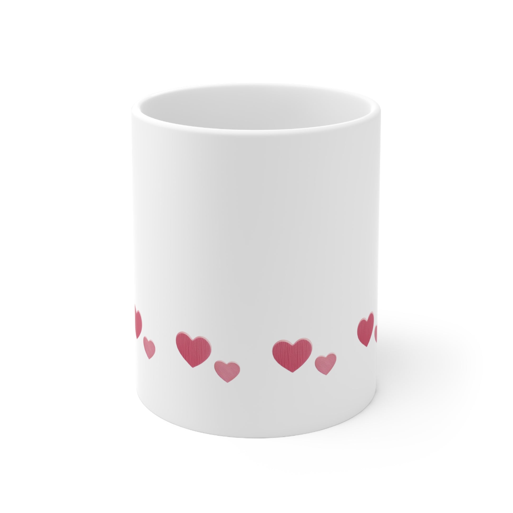 Front view of white ceramic mug with red heart design, 11oz size