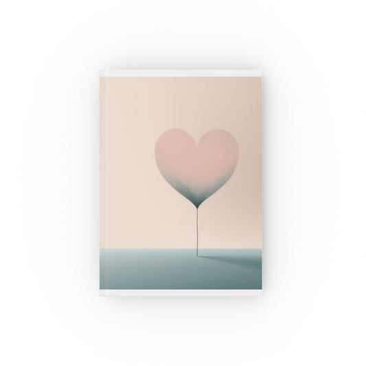 A5 hardcover journal with pale pink and blue cover with large floating heart illustration