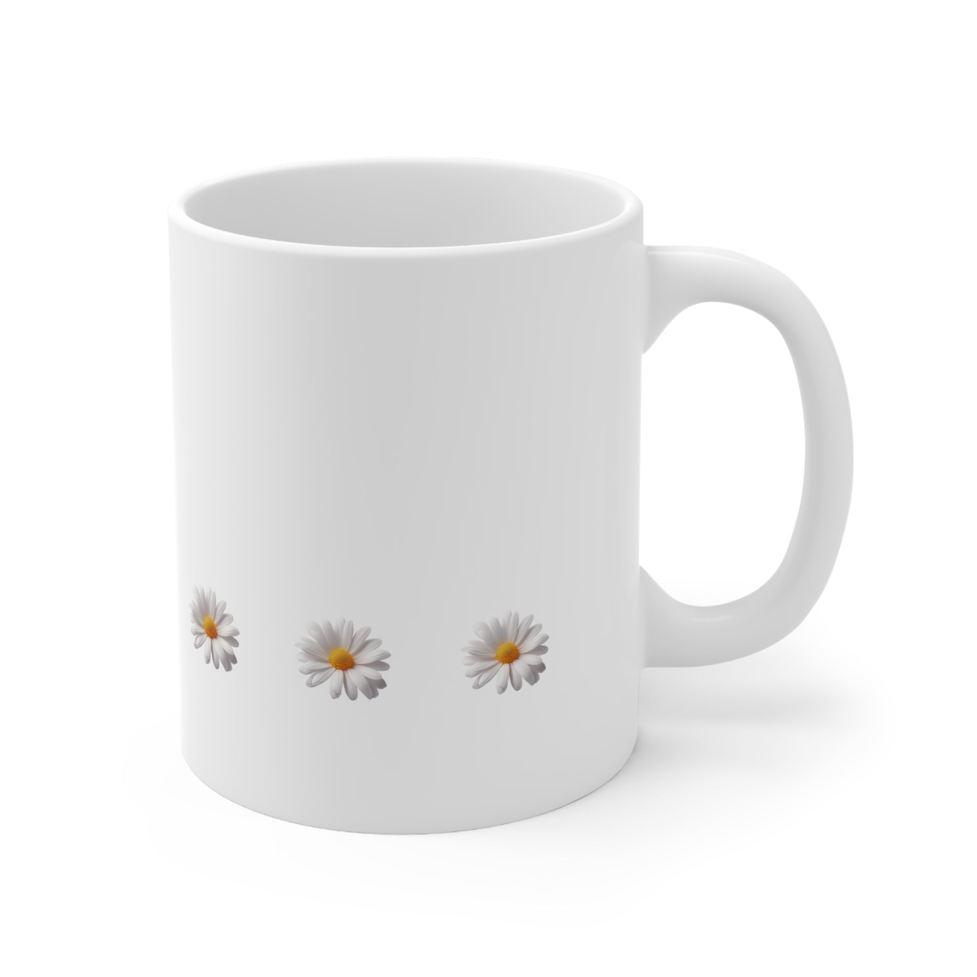 Right side view of white ceramic daisy mug, 11oz size, showing handle