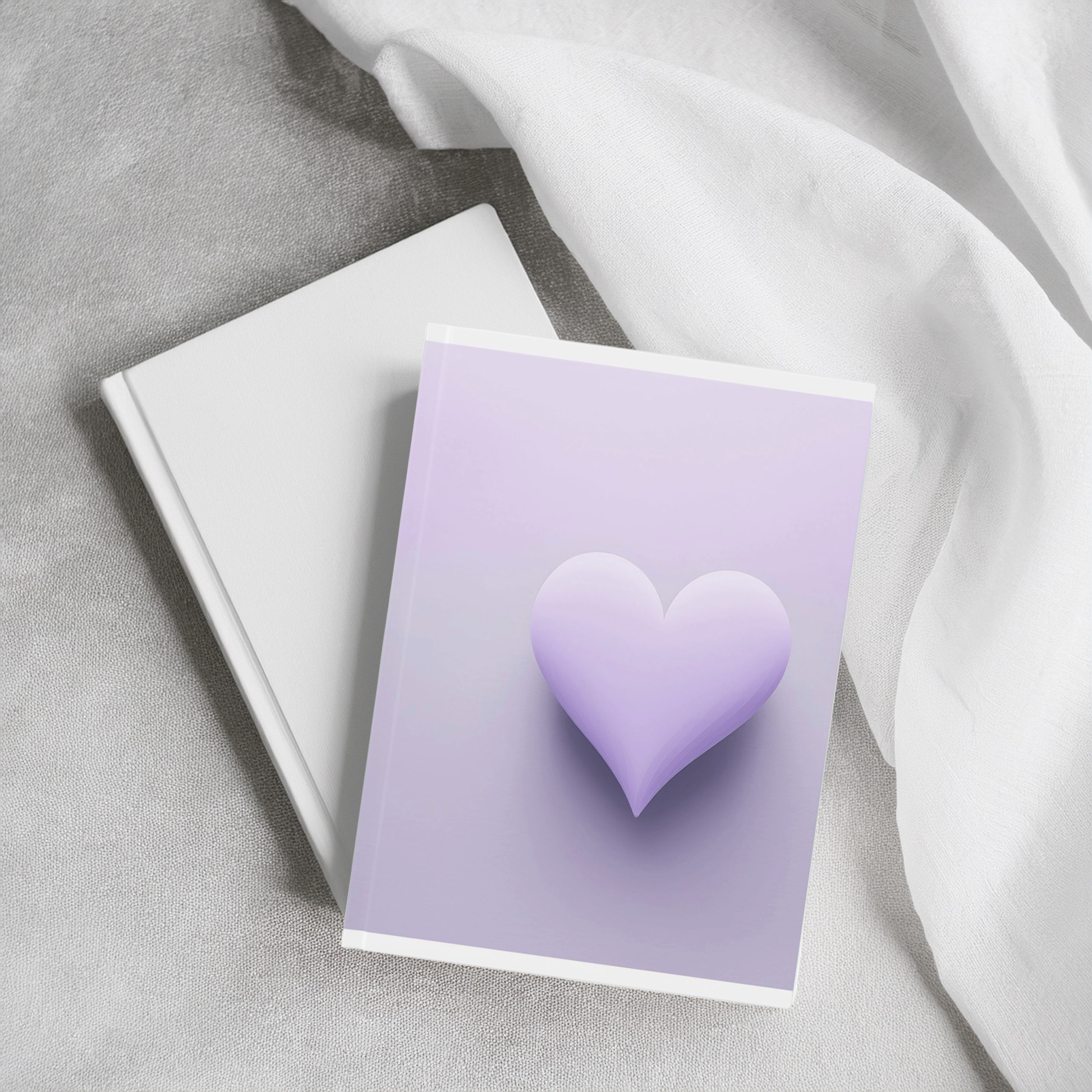 Purple and white heart aesthetic A5 journal, styled stacked on book on cement surface with linen